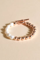 Adorne Half Pearl Metal Ball Toggle Bracelet | Gold/Cream_Silvermaple Boutique